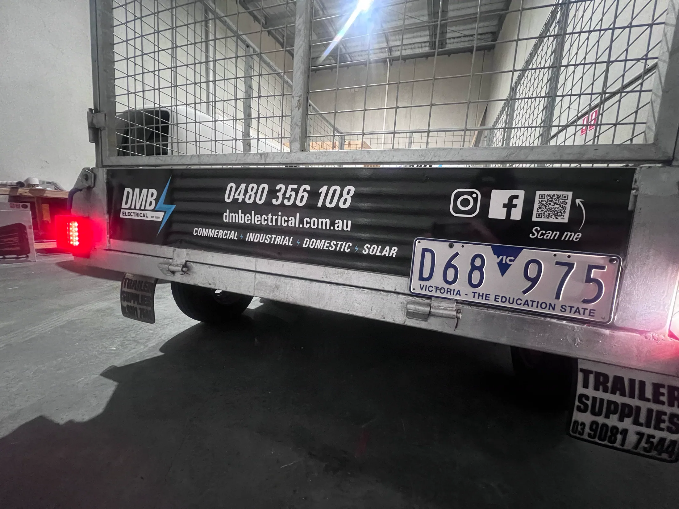 DMB Electrical fleet graphics rear tray view