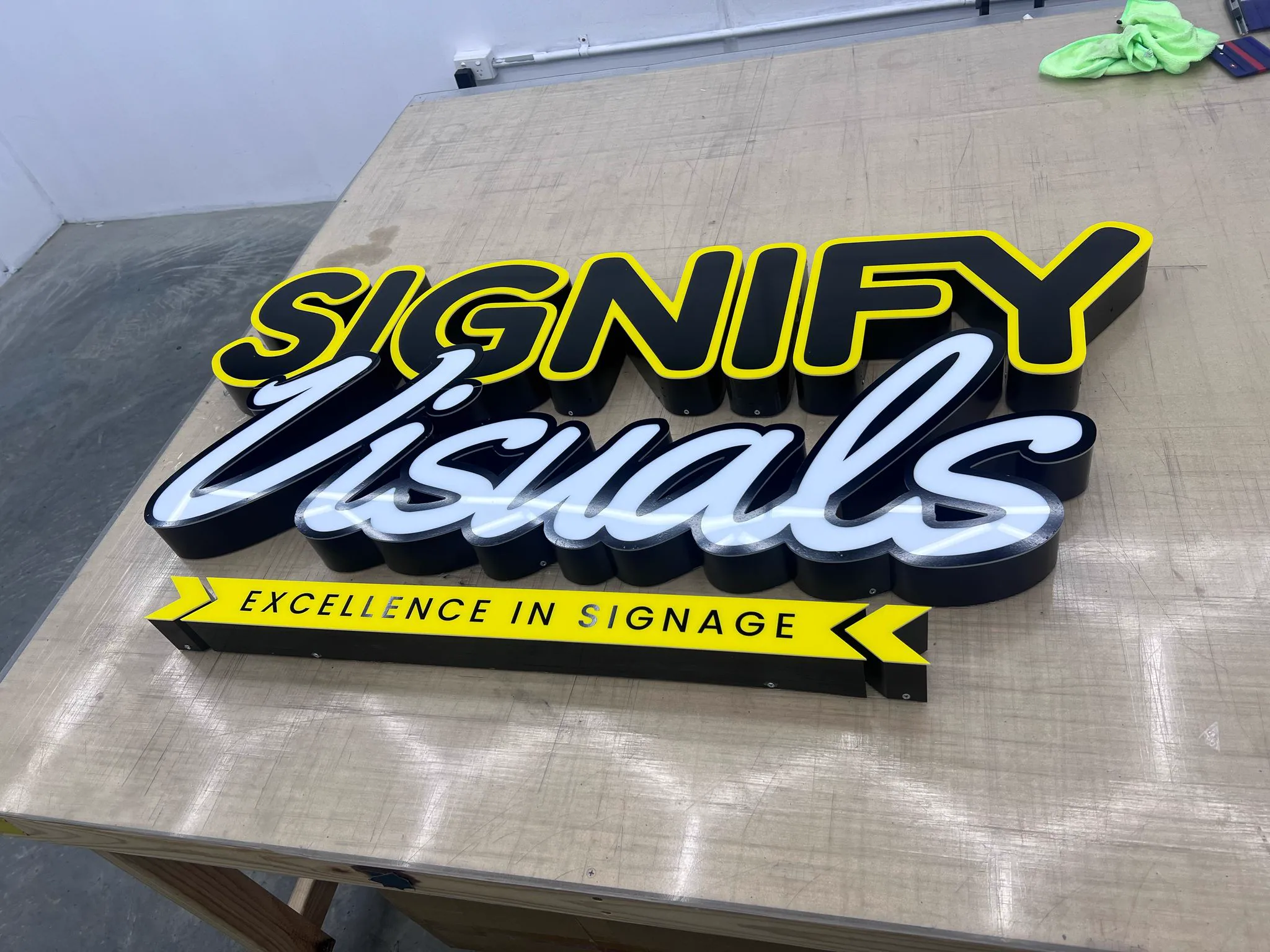 Signify Visuals branded workshop sign