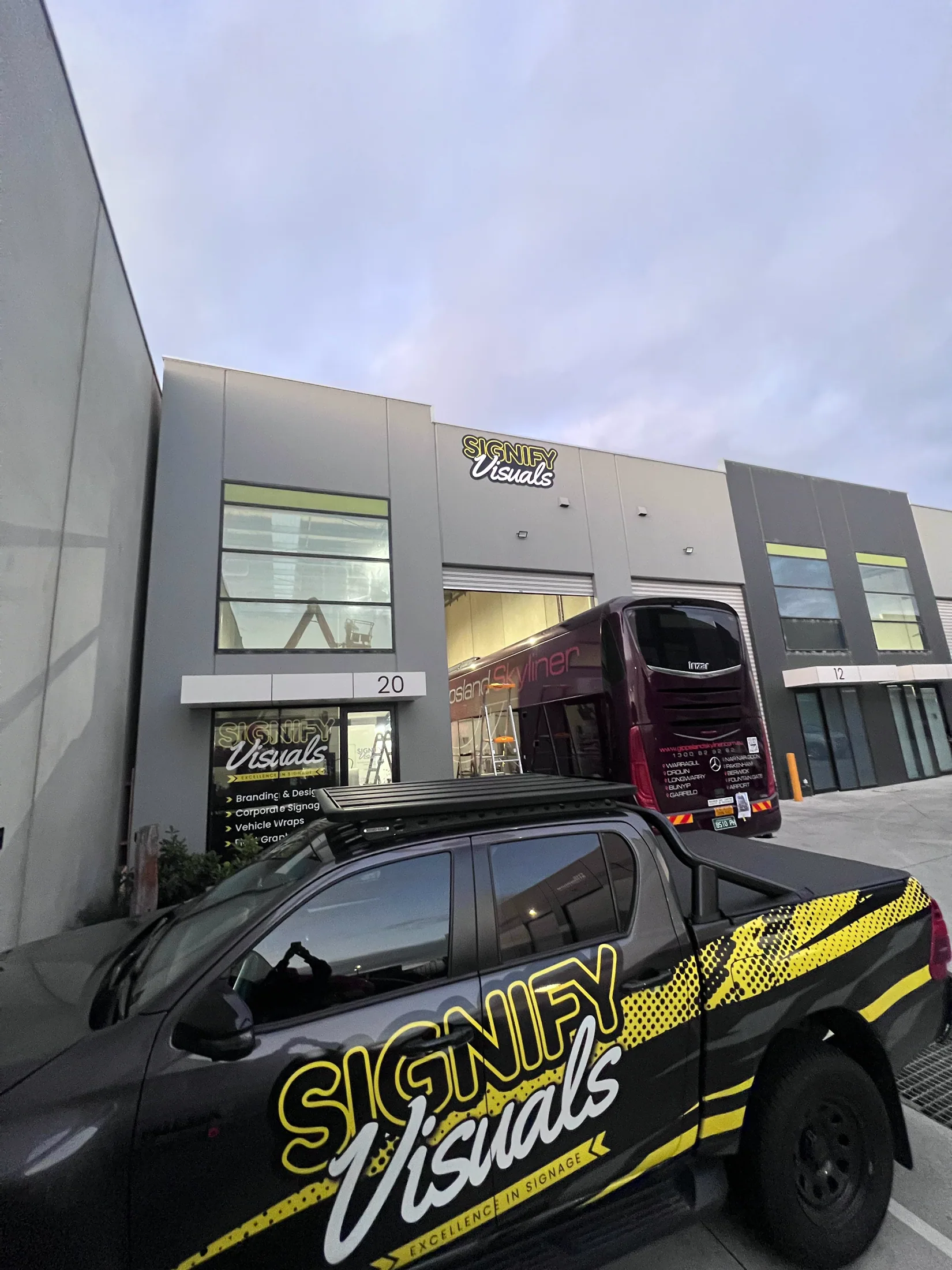 Signify Visuals branded ute at the studio frontage